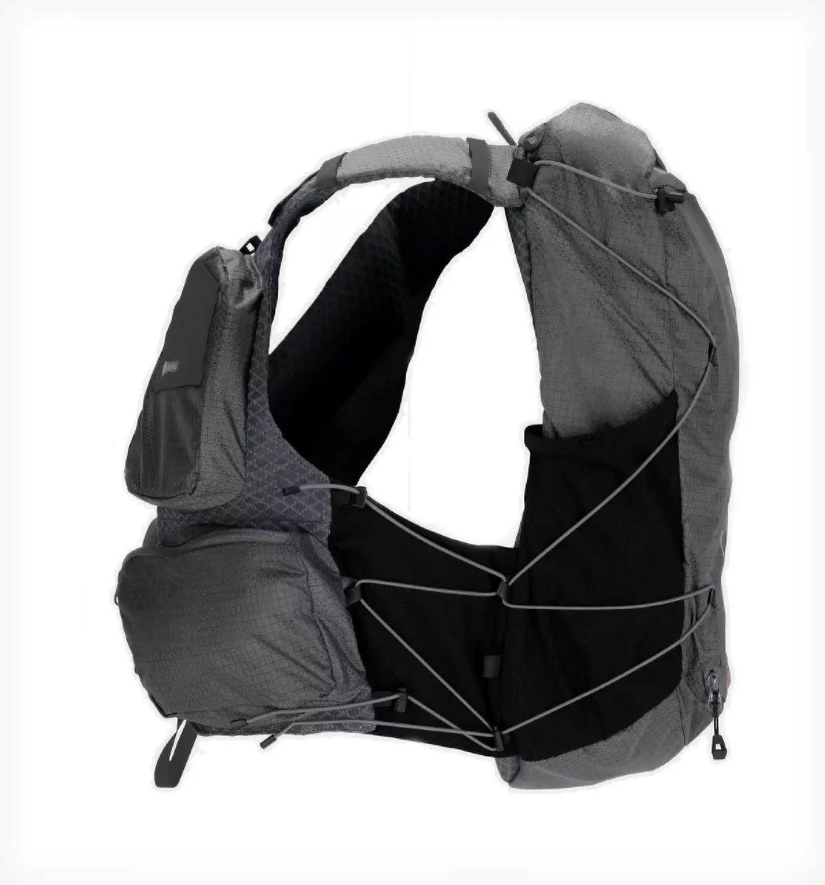 Studio photo of Simms Flyweight Vest Pack; side view. 