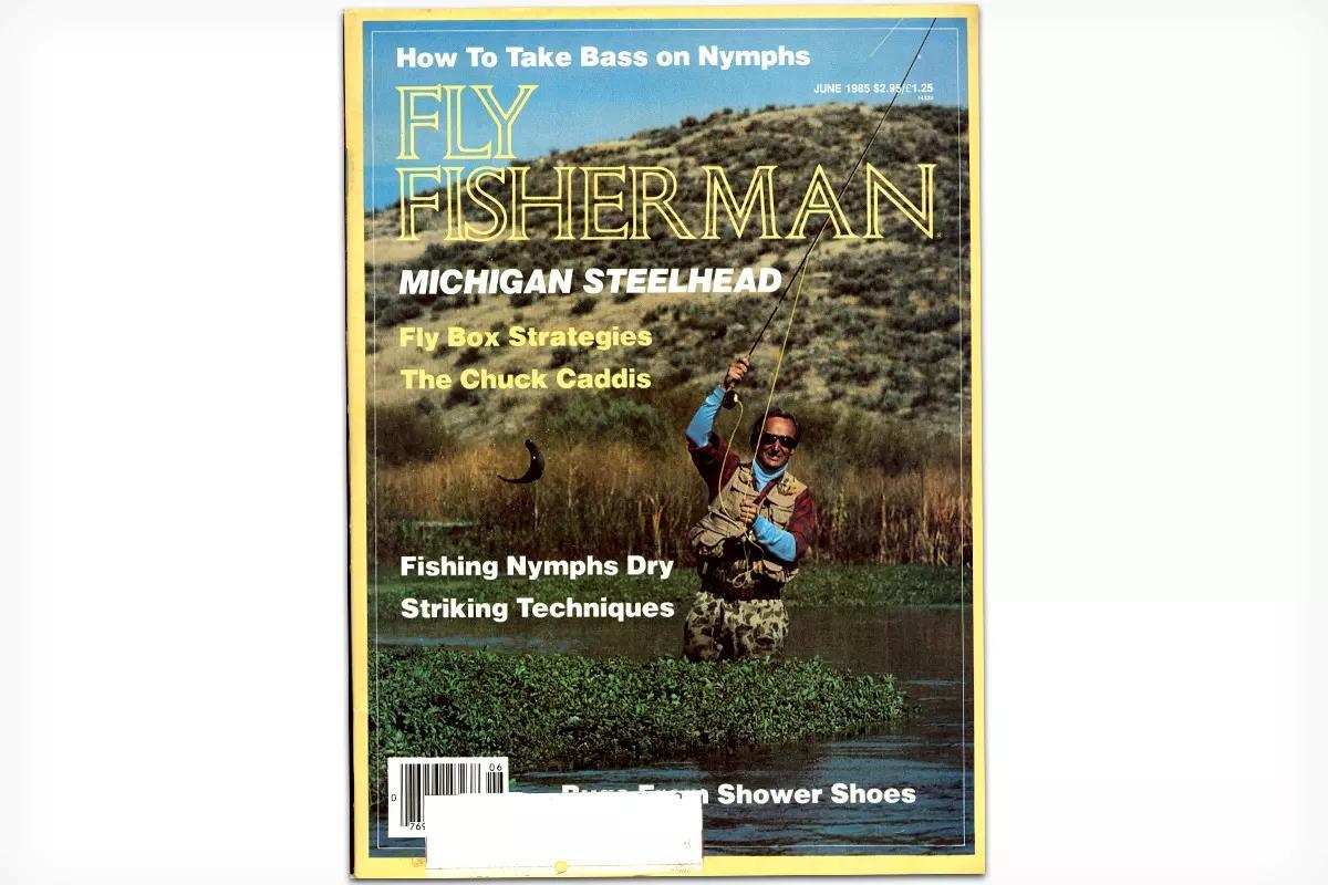 The cover of the June 1985 issue of Fly FIsherman featuring a fly angler hooked up to a jumping fish. 