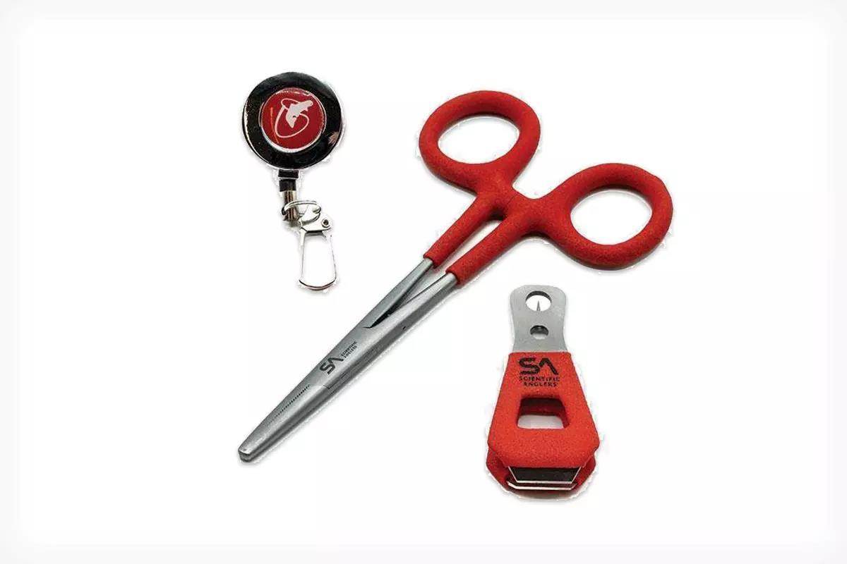 Studio photo of Scientific Anglers Tailout Tool Assortment with forceps, nippers, and retractor. 