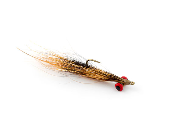 A tan and red Clouser Minnow fly.
