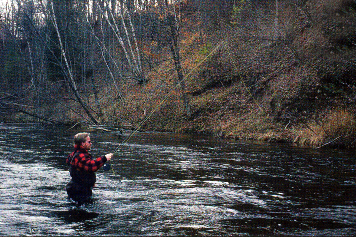 Kelly Galloup high-stick nymphing a run on a Great Lakes tributary